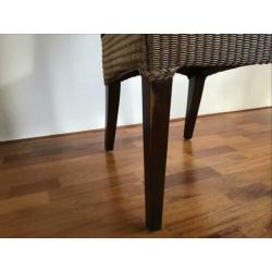Vier stuks Lloyd loom stoelen.