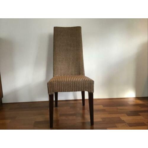 Vier stuks Lloyd loom stoelen.