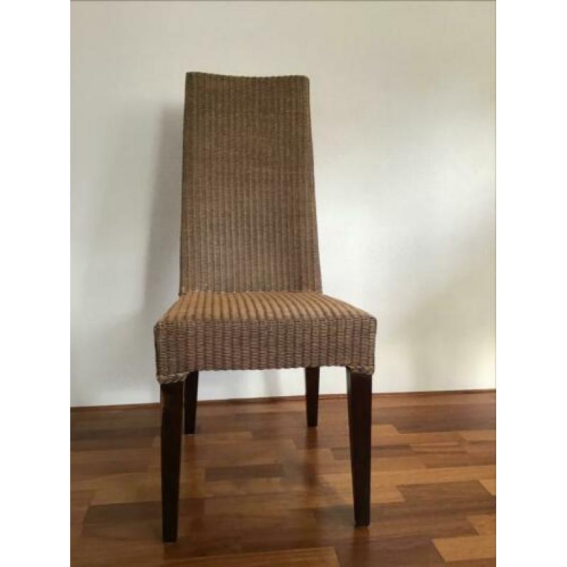 Vier stuks Lloyd loom stoelen.