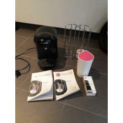 Tassimo met cupjes houder en boekjes.