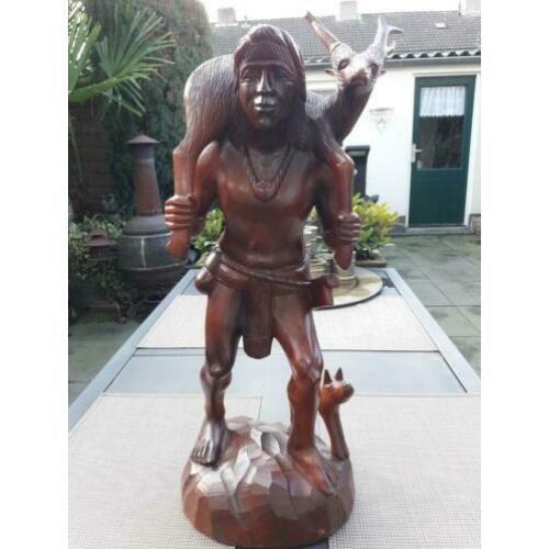 Indonesië houtsnijwerk jager