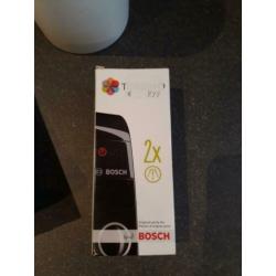 Tassimo met cupjes houder en boekjes.