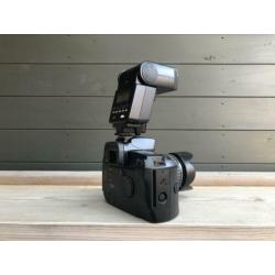 Canon eos 5 + 28-105mm + 430 flitser