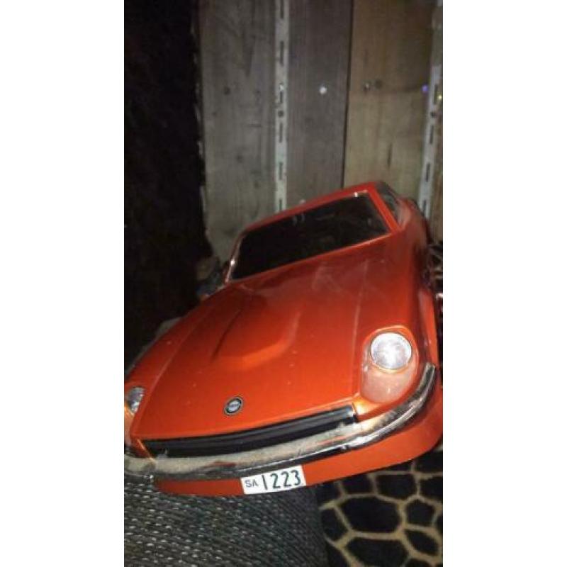 Mooie kap Nissan fairlady originele lakkleur verlicht