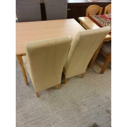 Eettafel stoelen blank leer 15 euro per stuk