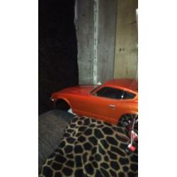 Mooie kap Nissan fairlady originele lakkleur verlicht