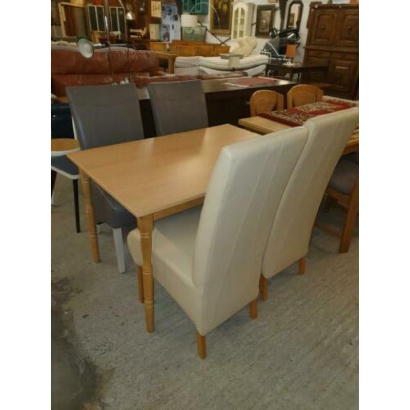 Eettafel stoelen blank leer 15 euro per stuk