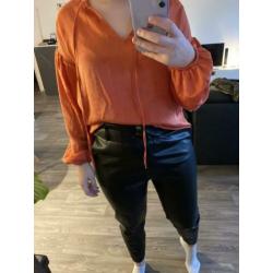 Koraal kleurige blouse costes