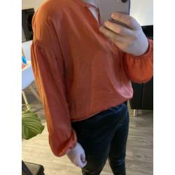 Koraal kleurige blouse costes