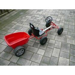 skelter kleur rood met aanhanger.