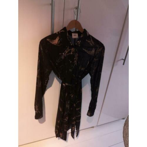 Zwangerschapskleding: lange blouse en jurkjes