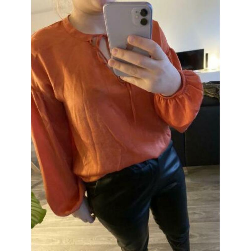 Koraal kleurige blouse costes