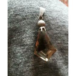 Rookwarts hanger, het handje edelsteen met zilveren oogjes