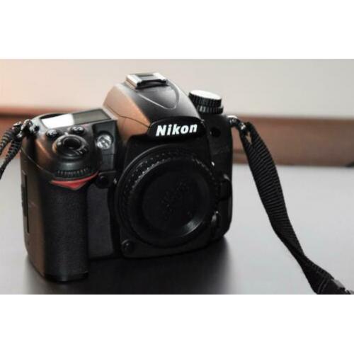 Nikon D7000 met slechts 2400 clicks + tas