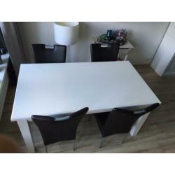 Vier stoelen imitatie leer