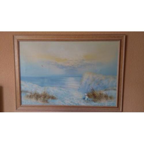 Olieverfschilderij in lijst. Zeezicht met vrouw in duinen.