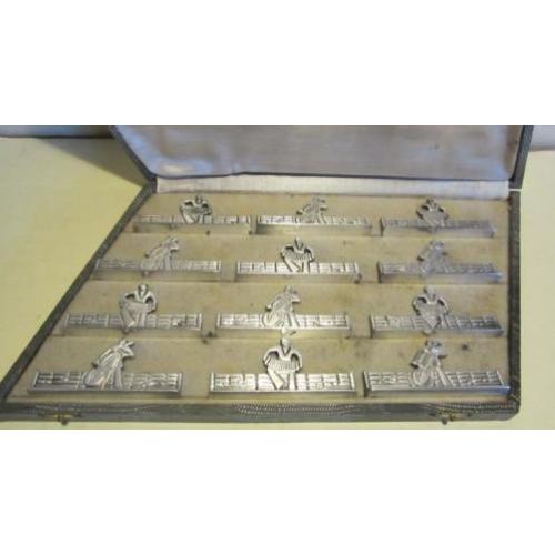 Set 12 art deco messenleggers muziek contrabas harmonica