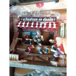 9 leuke kersthuisjes/marktkraampjes in doosjes met licht.