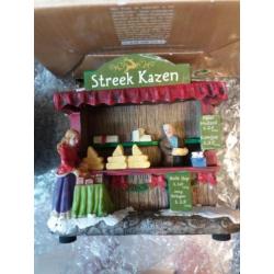 9 leuke kersthuisjes/marktkraampjes in doosjes met licht.