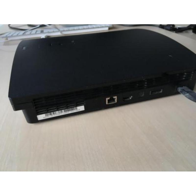 Playstation 3 + 2 controllers & spellen!