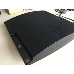 Playstation 3 + 2 controllers & spellen!